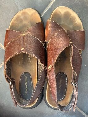 Well worn sandals.